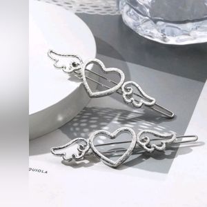 New 2pc silver winged hearts barrettes